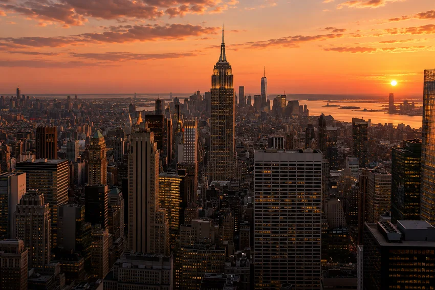 Manhattan skyline and the Empire State Building at sunset